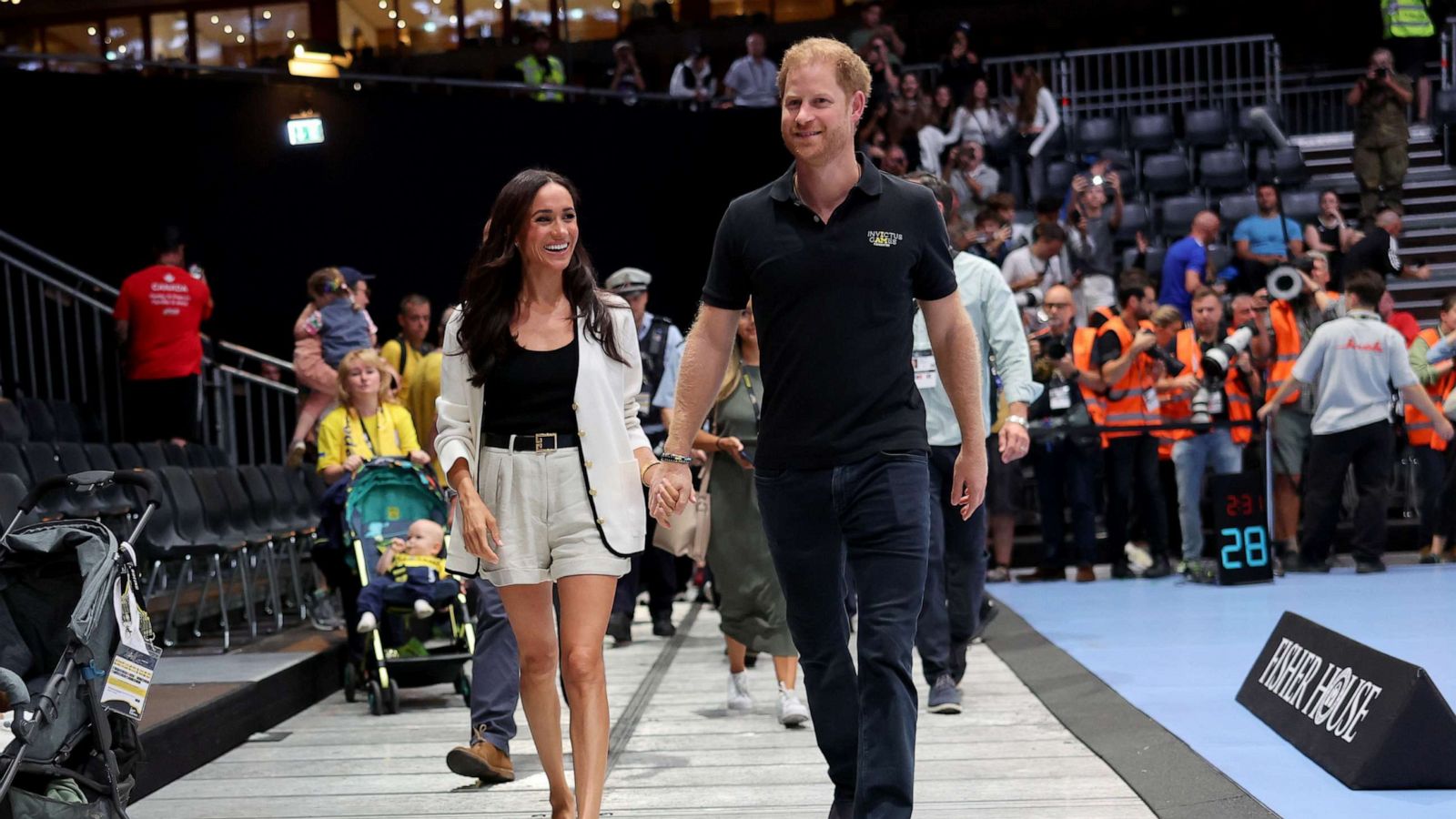 PHOTO: Prince Harry, Duke of Sussex and Meghan, Duchess of Sussex attend the Wheelchair Basketball preliminary match between Ukraine and Australia during day four of the Invictus Games Düsseldorf 2023 on Sept. 13, 2023 in Duesseldorf, Germany.