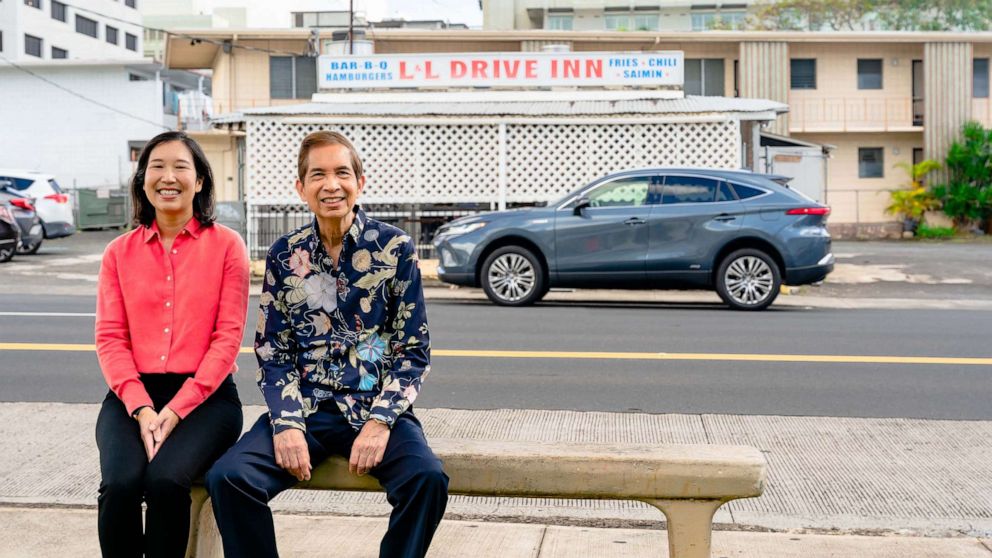 PHOTO: L&L Hawaiian Founder Eddie Flores and CEO Elisia Flores in front of their location in Liliha, Hawaii.