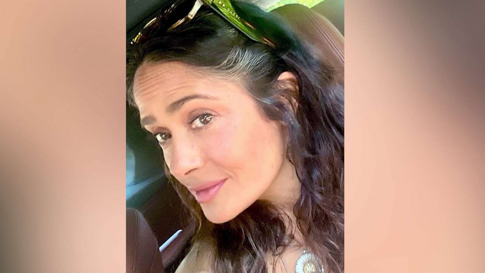 PHOTO: Salma Hayek posted a photo to social media with a tip on how she hides her grey hair, July 27, 2023.