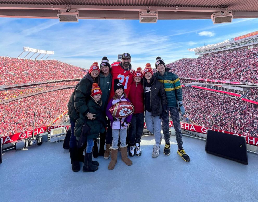 PHOTO: Walker Hayes, wife Laney and their six kids pose for a photo at a football game.