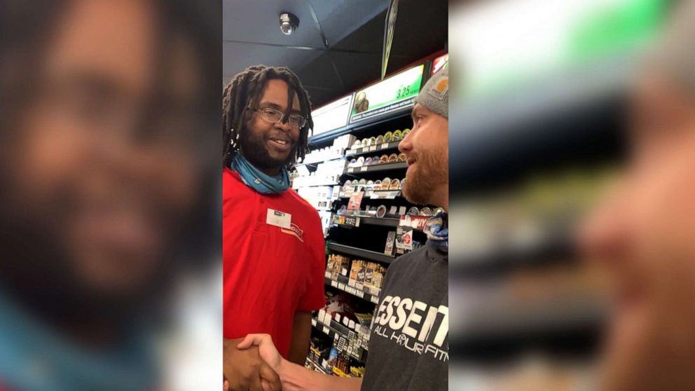 PHOTO: Gas station cashier Edward Hays Jr., 28, left, shakes the hand of David Daniels, 29, right, the man who crowdfunded thousands of dollars so Hays could have his own car to drive to his job, in Bossier City, Louisiana.