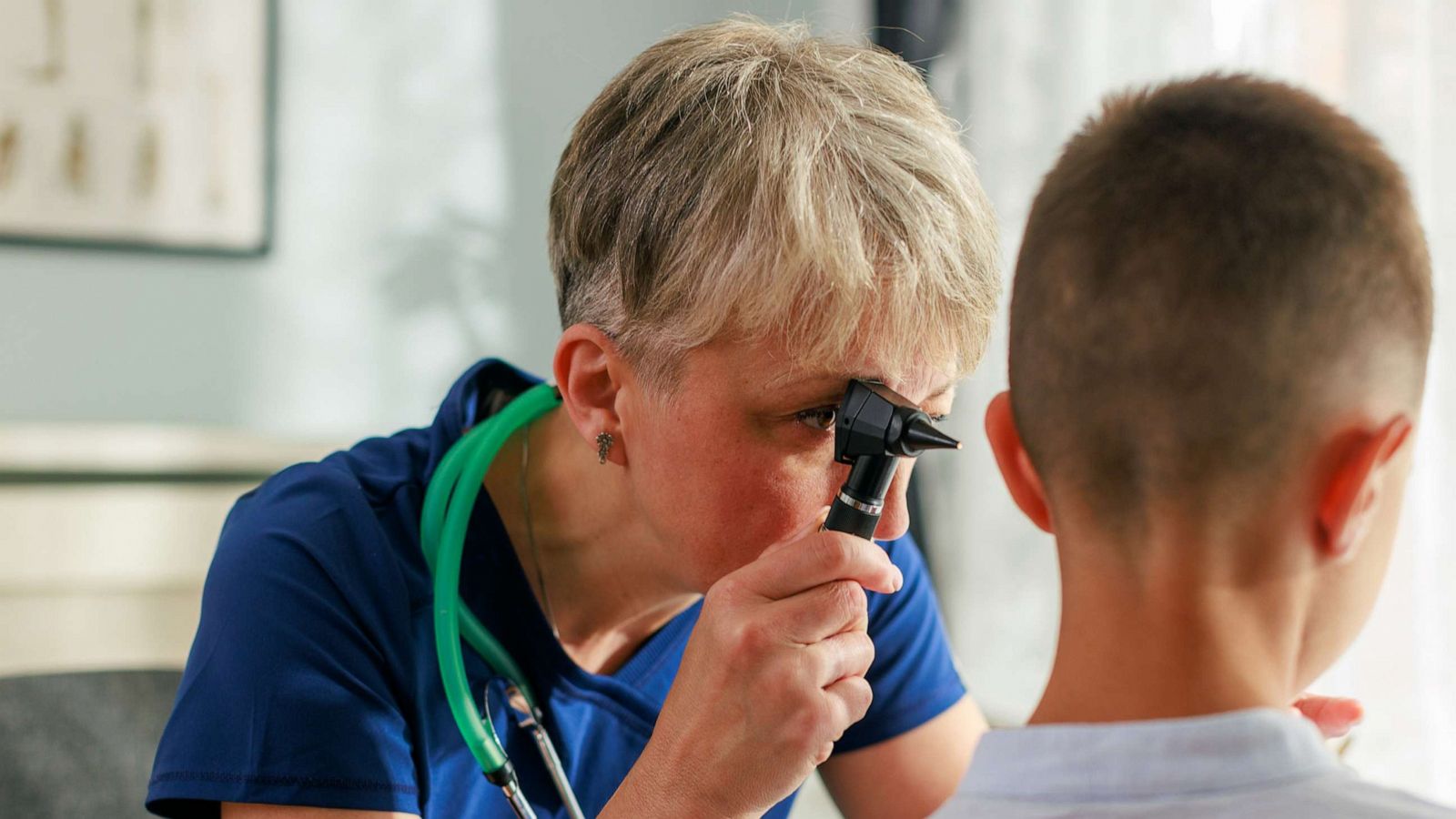 PHOTO: A doctor checks a child's ear in an undated stock photo.