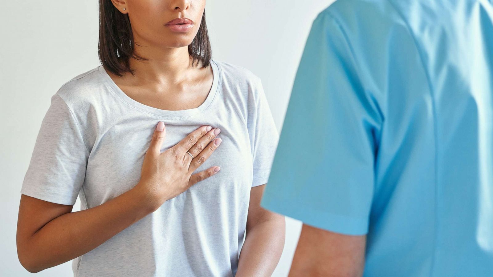 PHOTO: A woman holds her heart at a doctor's office in an undated stock photo.