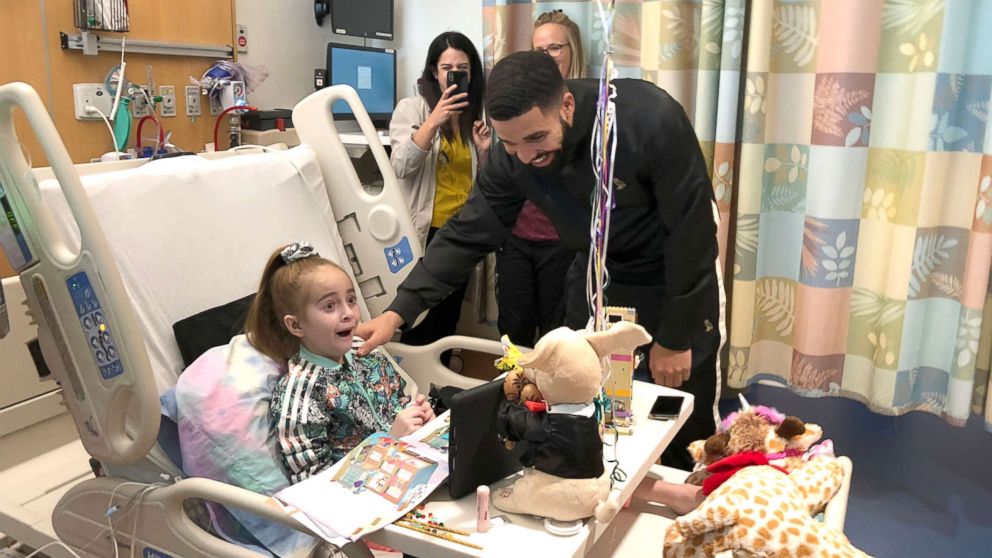PHOTO: Sofia Sanchez reacts to being surprised by Drake at the Ann & Robert H. Lurie Children's Hospital of Chicago.