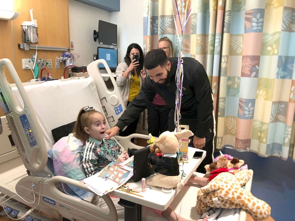 PHOTO: Sofia Sanchez reacts to being surprised by Drake at the Ann & Robert H. Lurie Children's Hospital of Chicago.