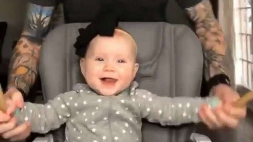 PHOTO: Marcel Desobeau, a firefighter paramedic and musician from Texas, drums with his 7-month-old daughter Lane in videos gone viral. The duo use drumsticks on Lane's high chair tray and post the footage on their TikTok page, "Heavy Metal Baby."