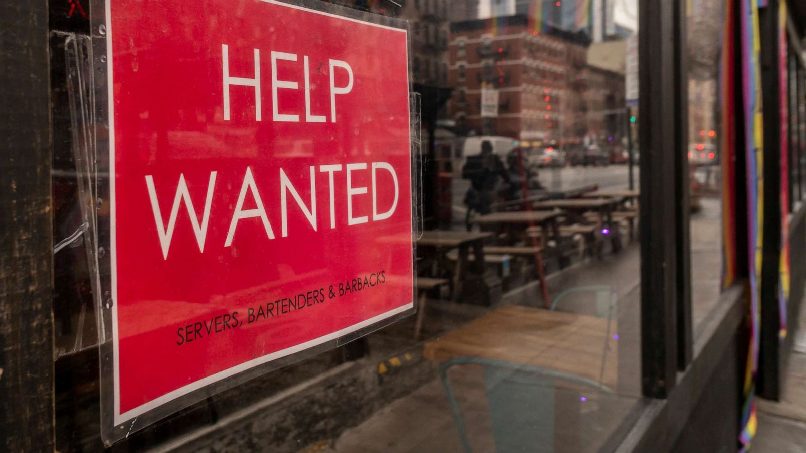 PHOTO: A help wanted sign hangs in a restaurant window in New York, Jan. 9, 2022.