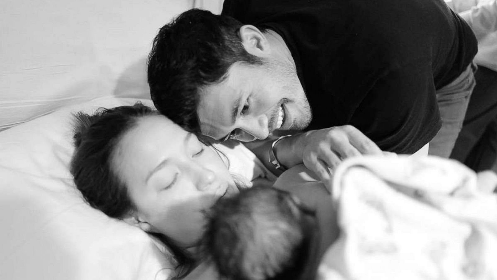 PHOTO: Henry Golding is seen with his wife and newborn in a photo he shared to his Instagram account.