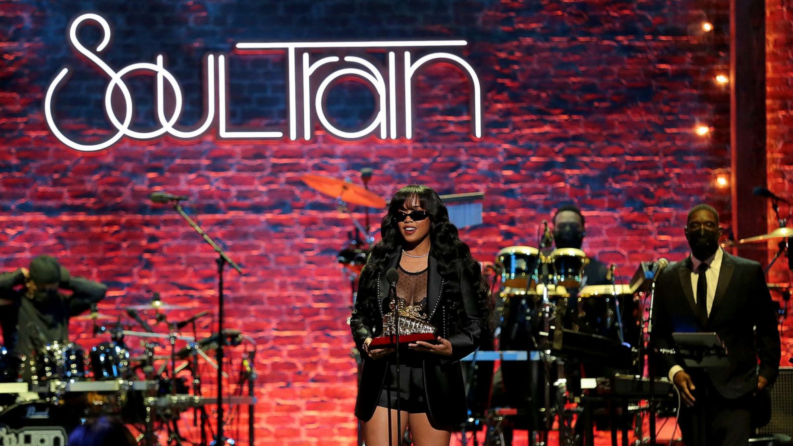 PHOTO: H.E.R speaks onstage at the 2020 Soul Train Awards presented by BET in Los Angels, in this image released on Nov. 29, 2020.