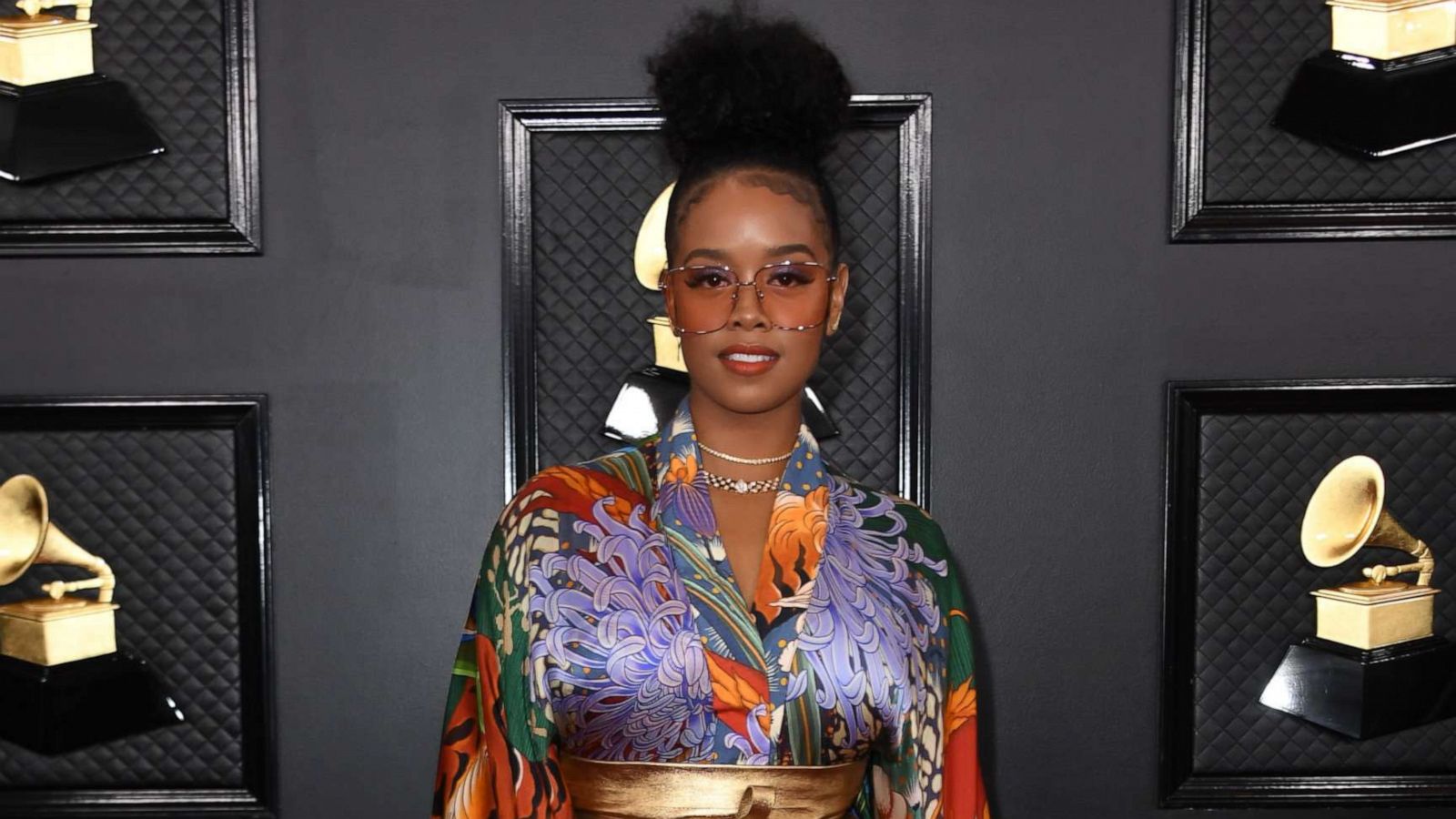 PHOTO: Singer Gabriella Wilson, aka H.E.R., arrives for the 62nd Annual Grammy Awards, Jan. 26, 2020, in Los Angeles.