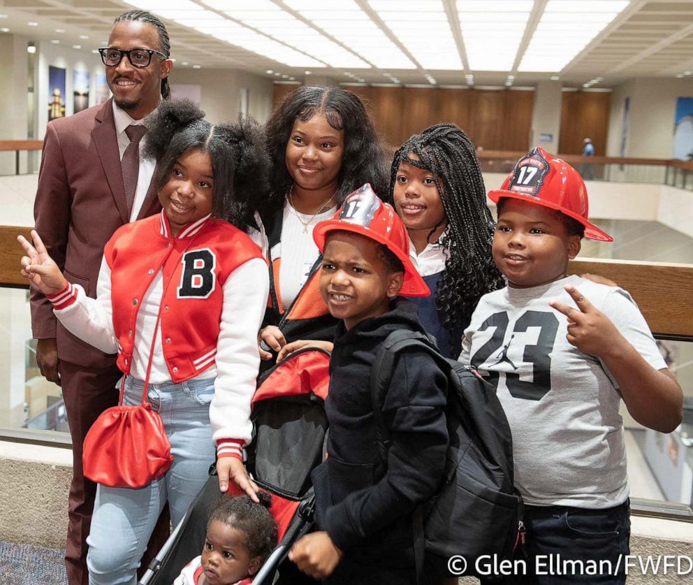 PHOTO: Jaziyah Parker is pictured with her family at a ceremony held to recognize her for making a life-saving 911 call.