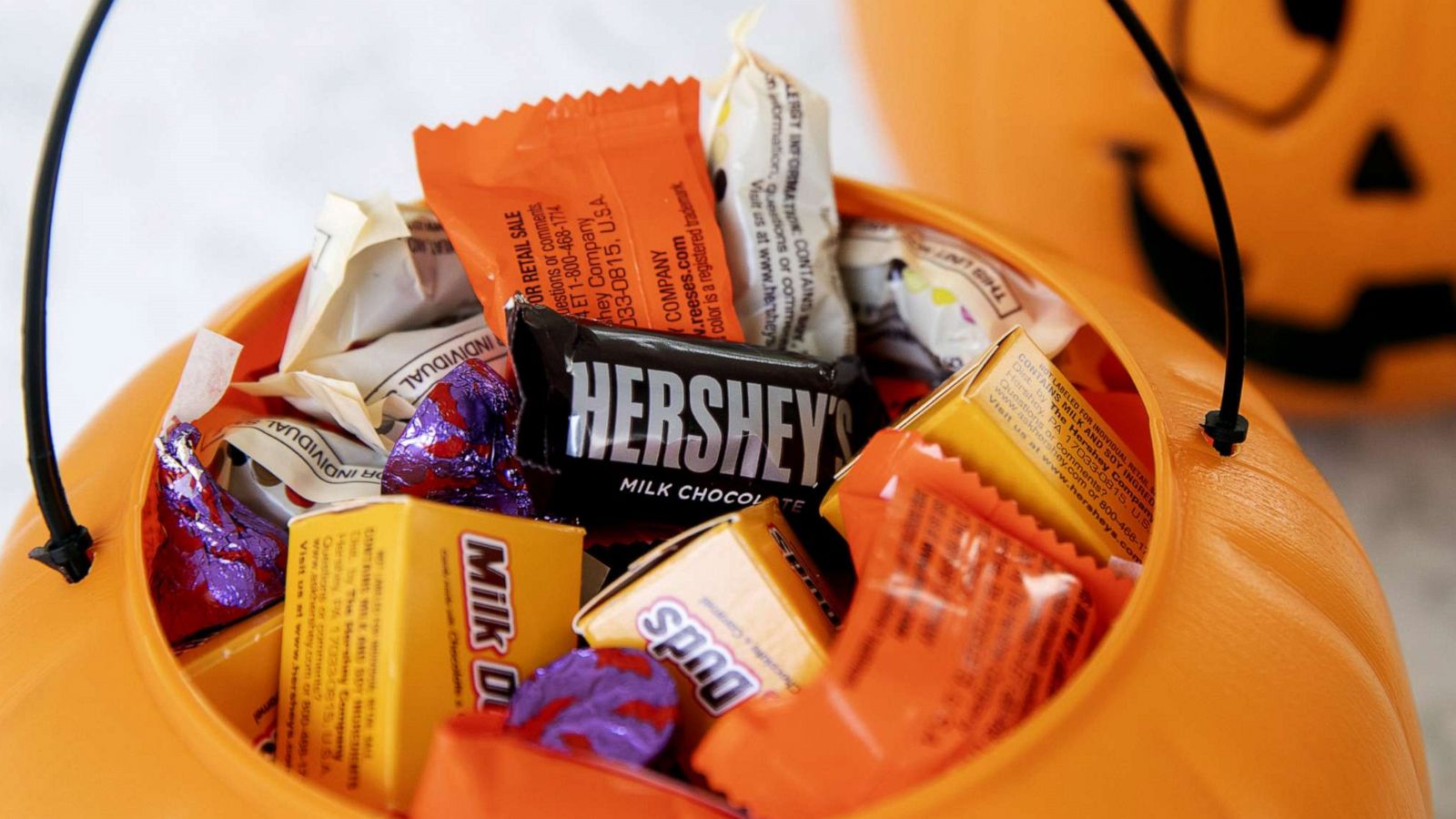 PHOTO: Hershey Co. brand Halloween candy is displayed inside a pumpkin-themed treat bucket in Tiskilwa, Ill., Sept. 20, 2020.