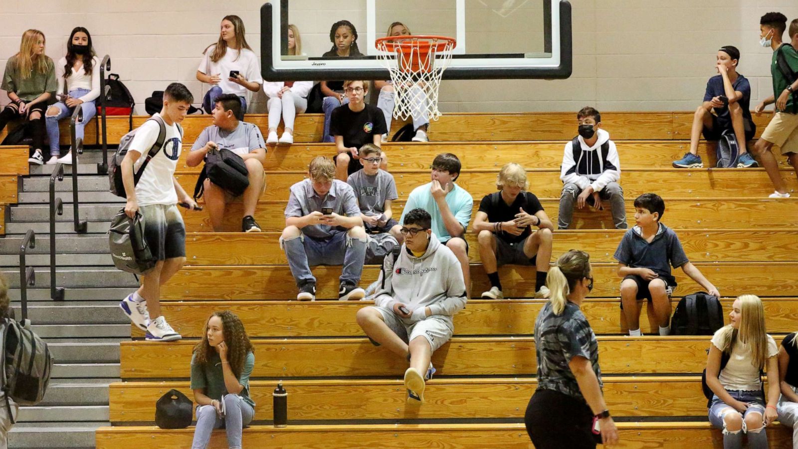 PHOTO: Sunlake High School students gather in the school gymnasium for P.E. orientation during the first day of school for Pasco County Students on Aug. 10, 2021, in Land O Lakes, Fla.