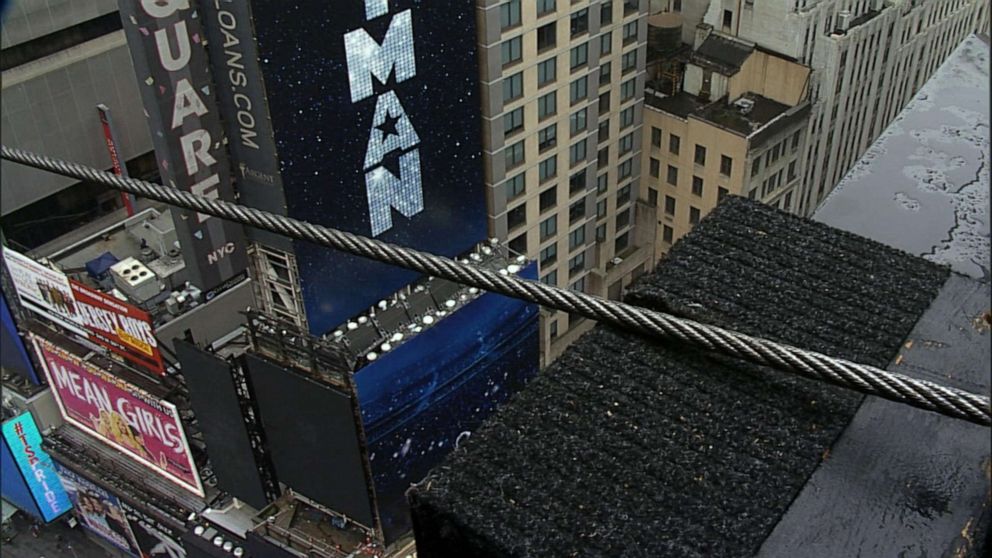 PHOTO: Acrobat siblings Nik and Lijana Wallenda prepare to attempt a highwire stunt in the middle of Times Square in New York City. 