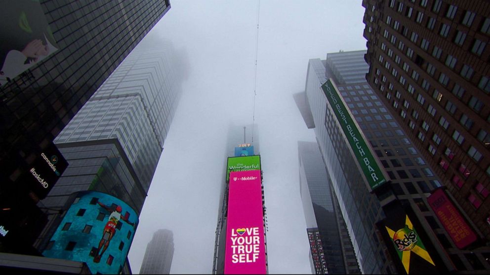 PHOTO: Acrobat siblings Nik and Lijana Wallenda prepare to attempt a highwire stunt in the middle of Times Square in New York City. 