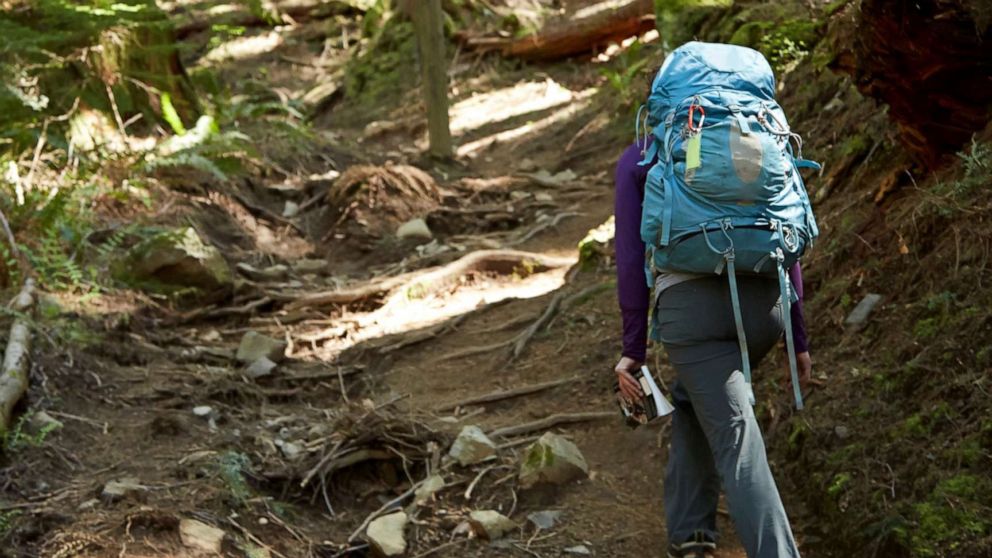 PHOTO: A hiker walks a path in this stock photo.