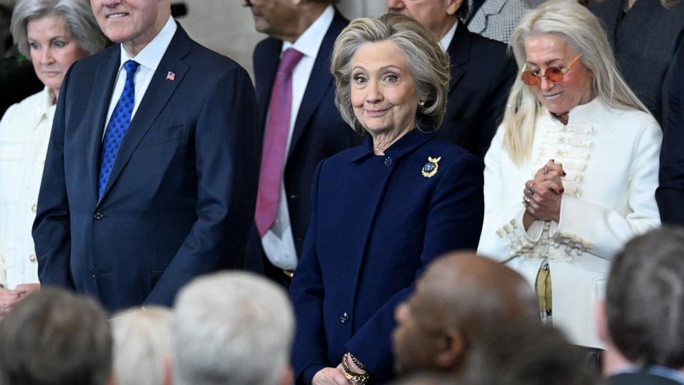 PHOTO: Former Secretary of State Hillary Clinton stands next to Miriam Adelson as they attend the inauguration ceremony before Donald Trump is sworn in as the 47th US President in the US Capitol Rotunda in Washington, DC, on January 20, 2025.