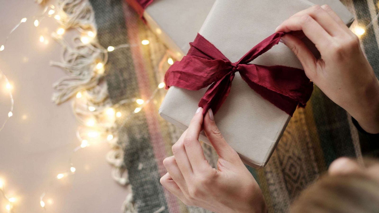 PHOTO: A gift is unwrapped in this stock photo.