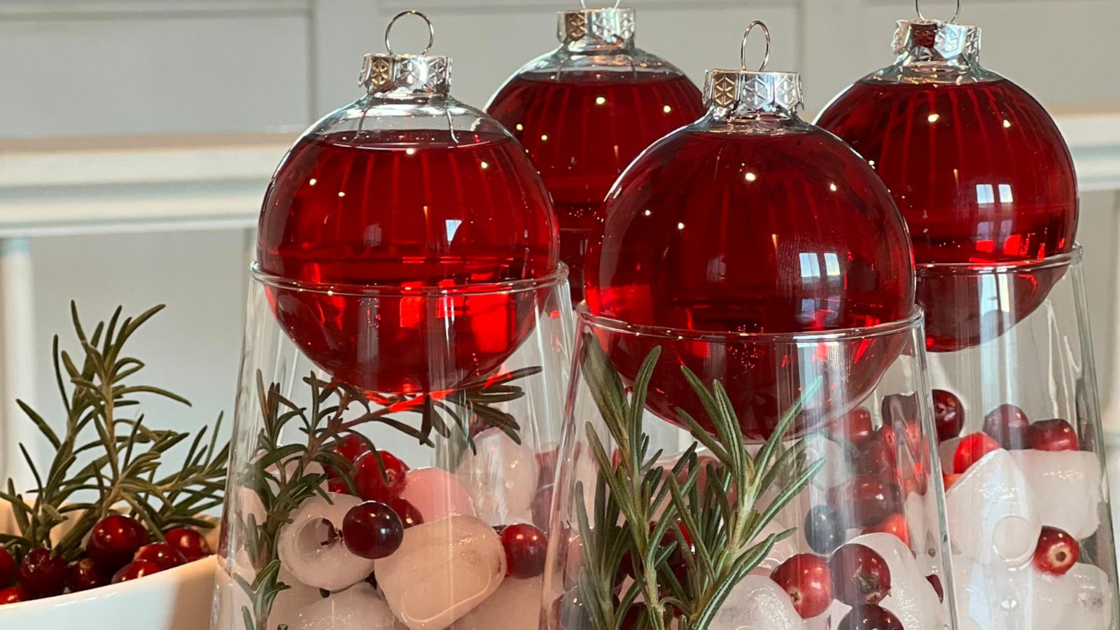 PHOTO: A festive holiday mocktail with cranberry juice filled ornaments.