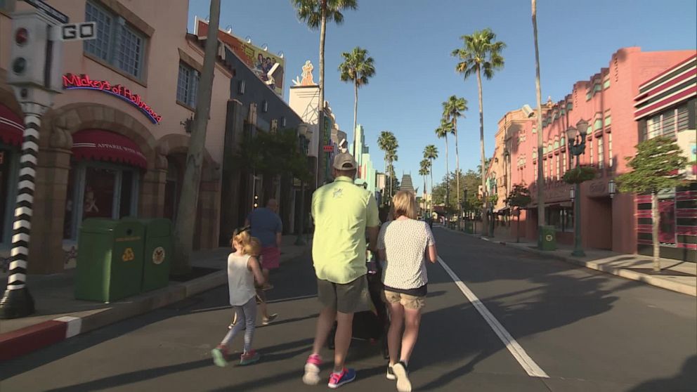 PHOTO: A family walks down Hollywood Boulevard at Disney's Hollywood Studios. 