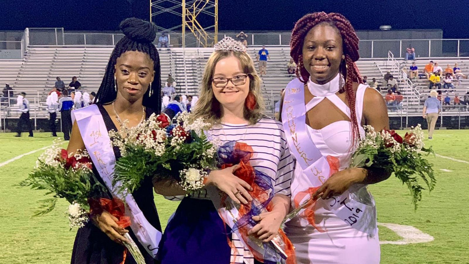 PHOTO: Homecoming court candidates who walked barefoot across a football field in South Carolina in solidarity with their classmate.