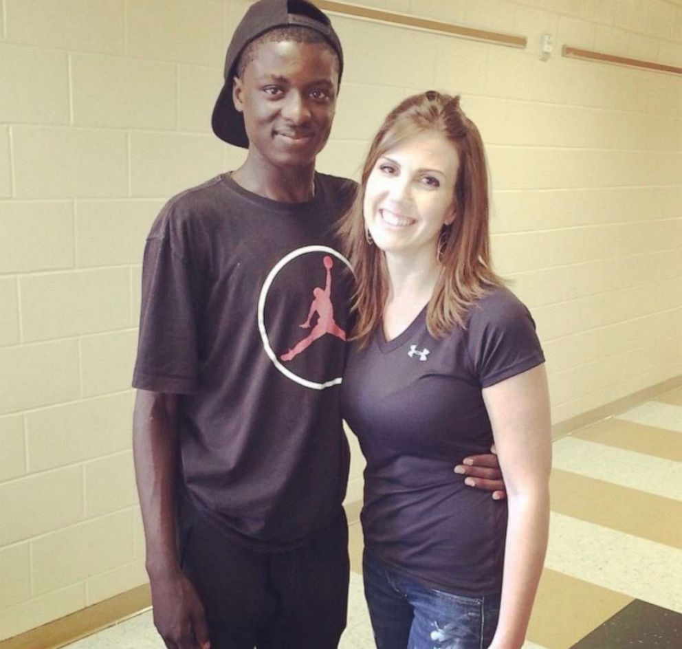 PHOTO: Amonte Green is seen in 2015 on the last day of 8th grade with his teacher Kate Demory at Glenridge Middle School in Orlando, Florida. 