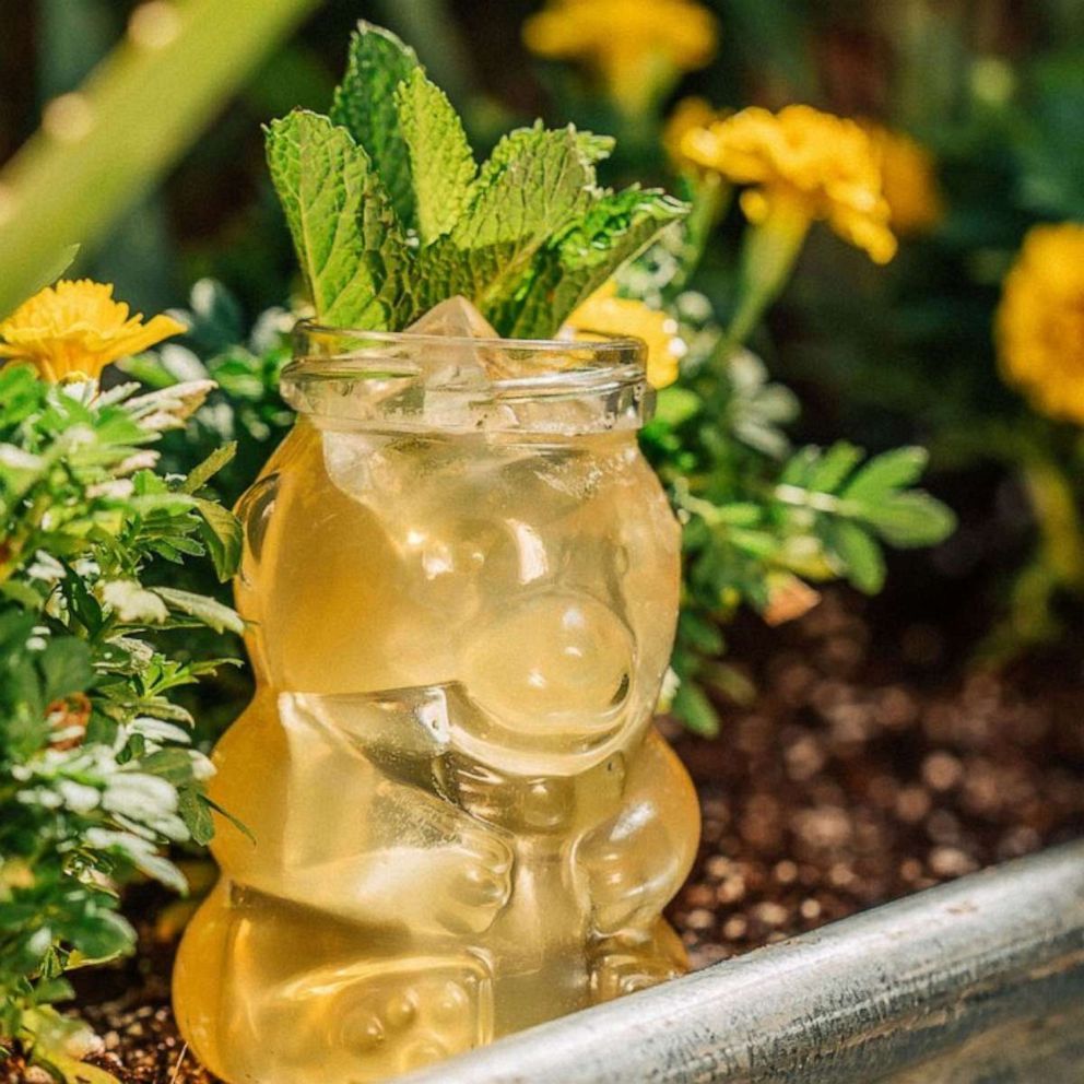 PHOTO: A honey bear glass with the herbed honey smash cocktail.