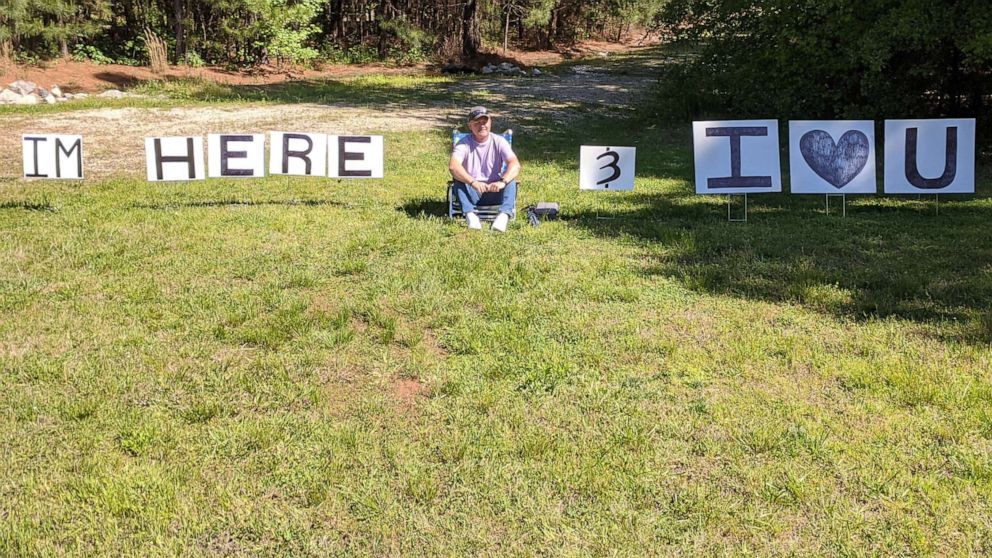 PHOTO: Dennis Cockrell sat outside wife Diana Cockrell's hospital room in a lawn chair with signs to show his support from a distance amidst the coronavirus pandemic.
