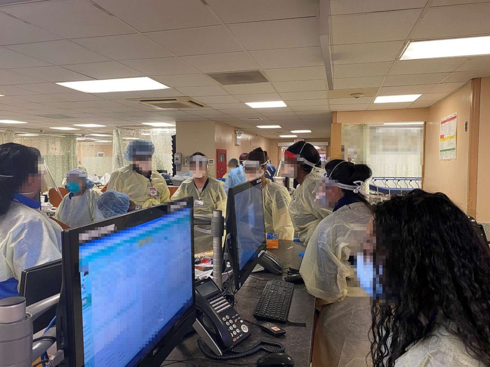 PHOTO: A group of medical workers inside Elmhurst's Emergency Room in Queens, N.Y., in 2020.