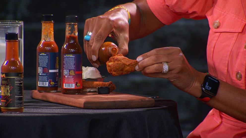 PHOTO: Hot Ones host Sean Evans enlisted "Good Morning America" anchor Robin Roberts to complete a live-version of the famed chicken wing challenge.