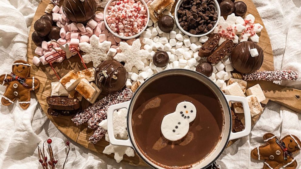 PHOTO: This festive winter hot cocoa board is filled with marshmallows, cocoa and peppermint.