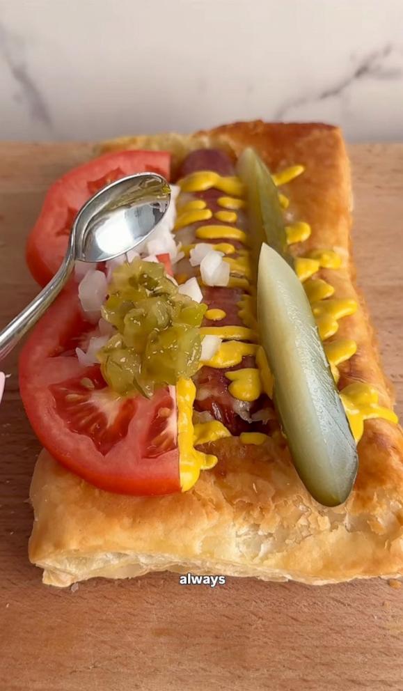 PHOTO: A puff pastry hot dog with cheese and Chicago-style toppings.