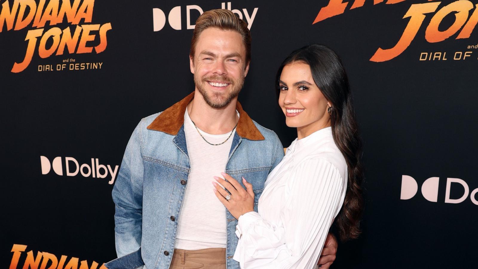 PHOTO: Derek Hough and Hayley Erbert attends the Indiana Jones and the Dial of Destiny U.S. Premiere at the Dolby Theatre in Hollywood, Calif., June 14, 2023.