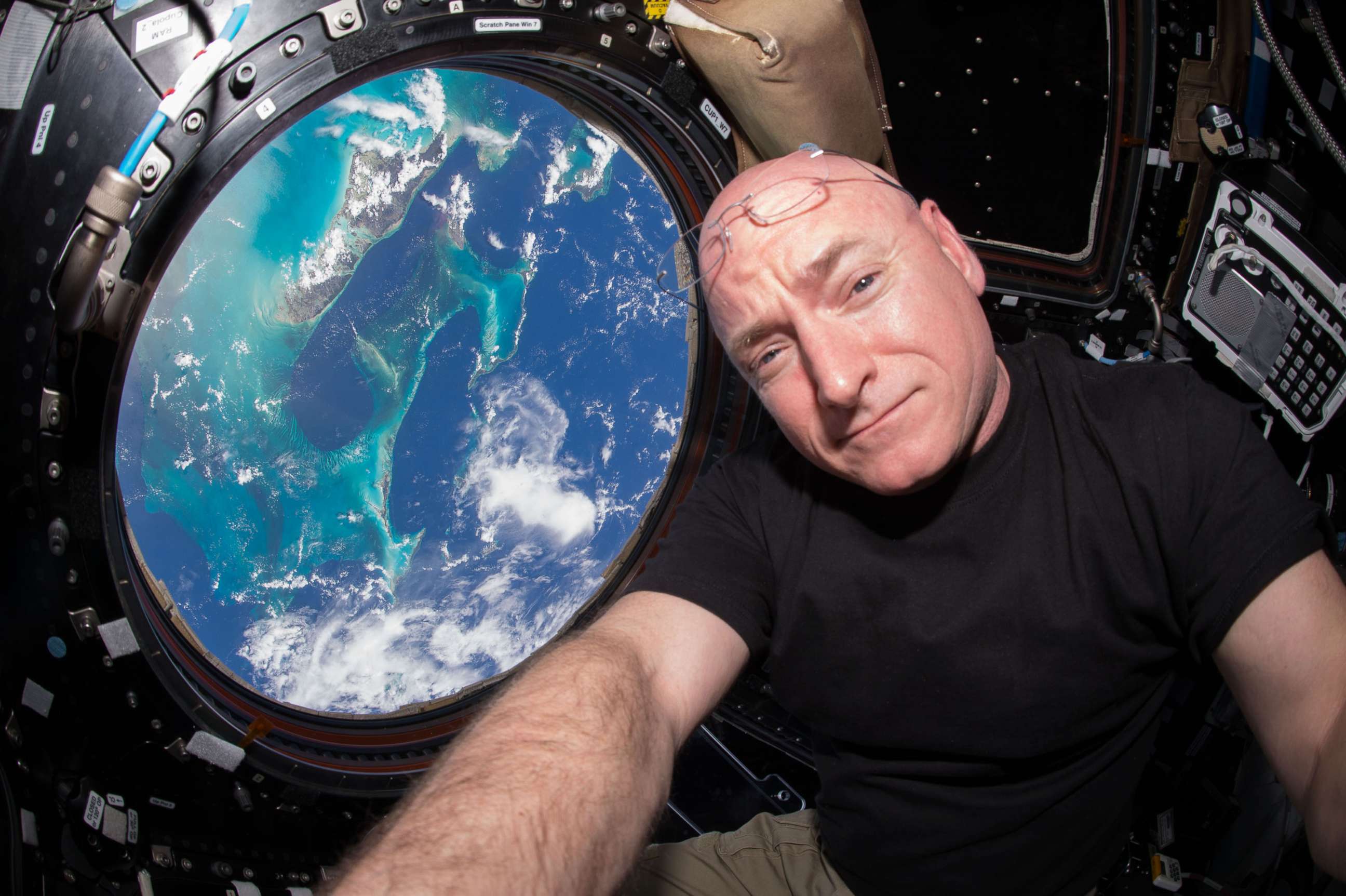 PHOTO: Expedition 44 flight engineer and NASA astronaut Scott Kelly seen inside the Cupola, a special module which provides a 360-degree viewing of the Earth and the International Space Station, July 2015.