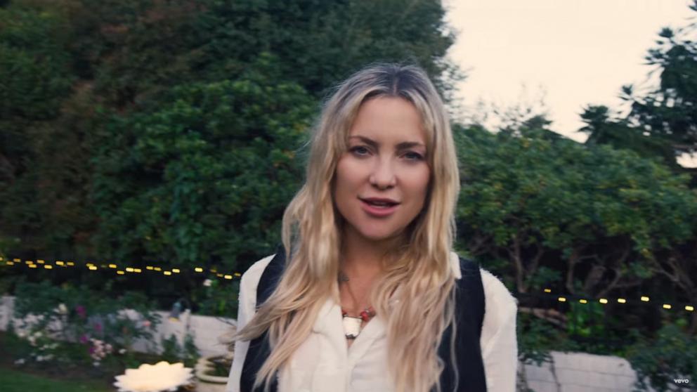 PHOTO: Kate Hudson in a music video for "Live Forever," 2024. 