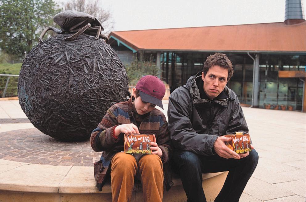 PHOTO: Nicholas Hoult and Hugh Grant on "About A Boy," 2002.