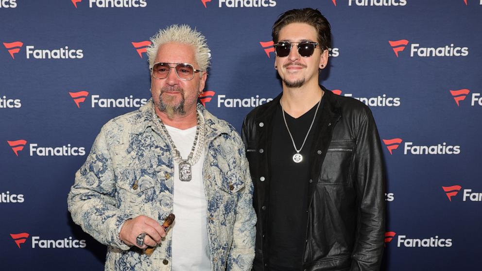 PHOTO: Guy Fieri, left, and son Hunter Fieri attend Michael Rubin's Fanatics Super Bowl party at the Marquee Nightclub at The Cosmopolitan of Las Vegas, Feb. 10, 2024, in Las Vegas.