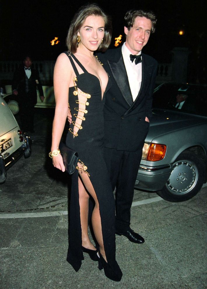 PHOTO: Hugh Grant and Elizabeth Hurley arrive at the post-premiere party of Grant's latest film, "Four Weddings and a Funeral" in London, 11 May 1994.