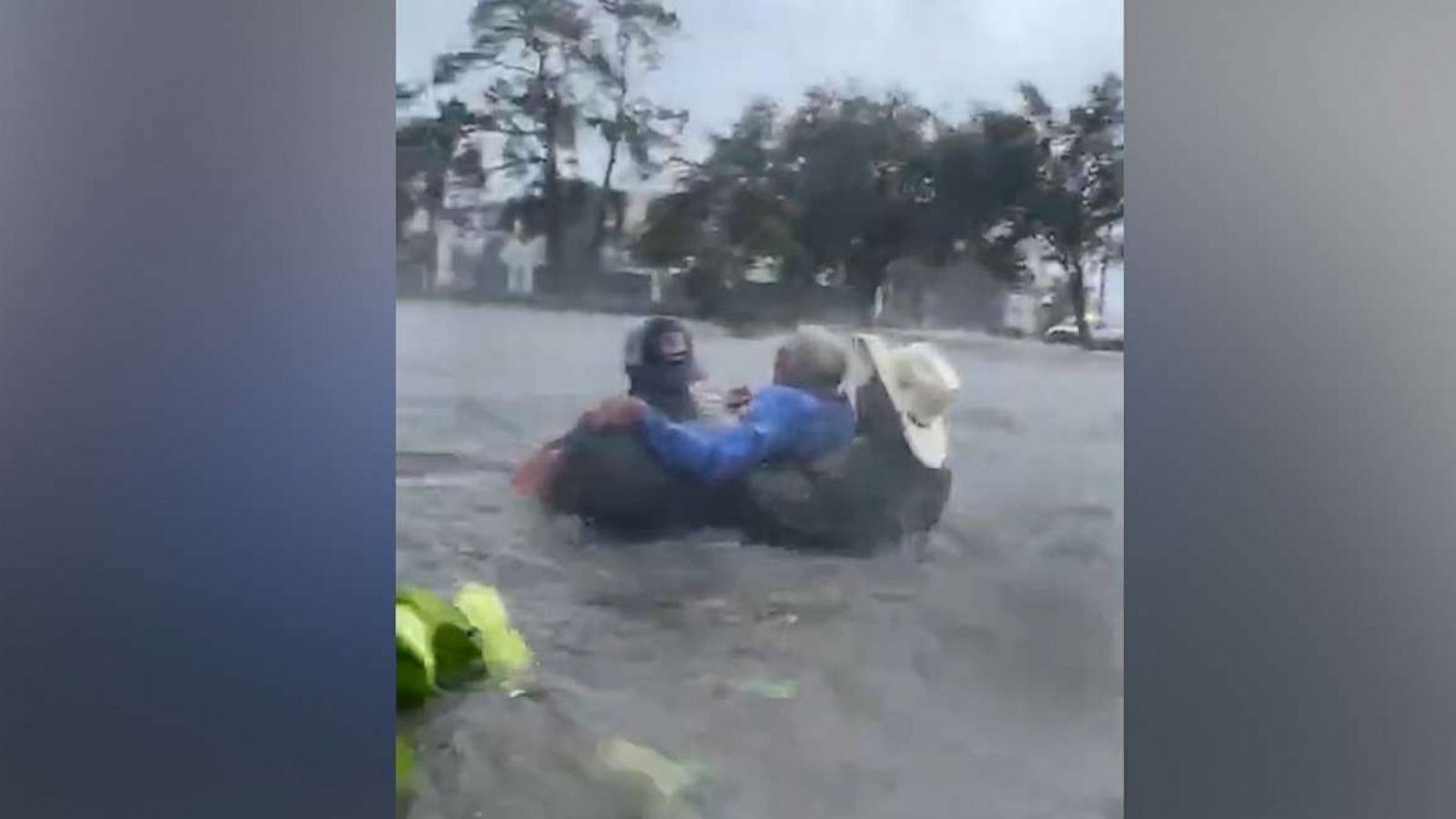 PHOTO: Good samaritans rescue a driver caught in floodwaters in in Bonita Springs, Fla, Sept. 28, 2022, as Hurricane Ian passed over the state.