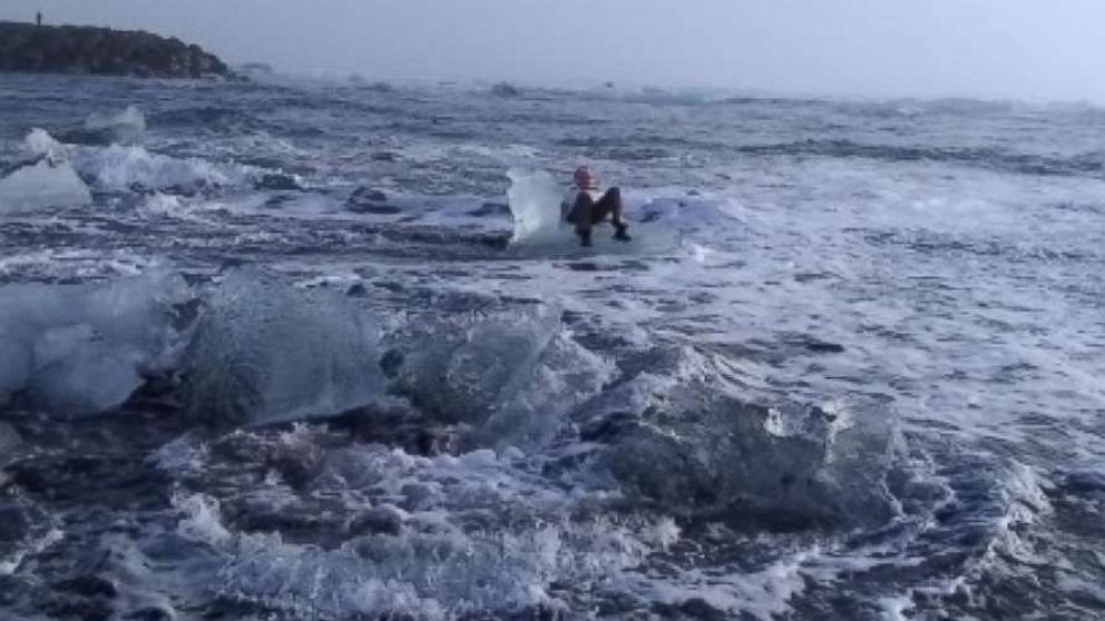 PHOTO: Judith Streng posed seated on an iceberg while her son Rod Streng took a picture before a wave pulled her out and prompted a rescue.