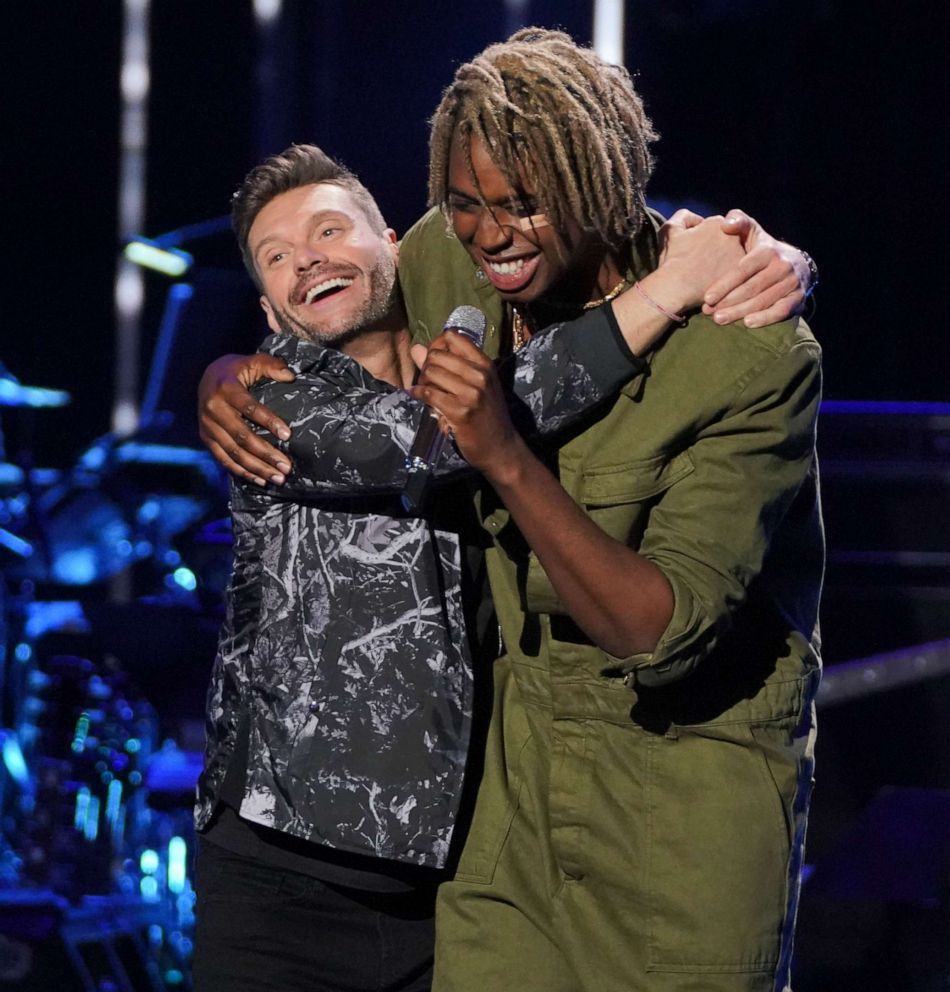 PHOTO: Ryan Seacrest embraces Uche on stage during American Idol, April 1, 2019.