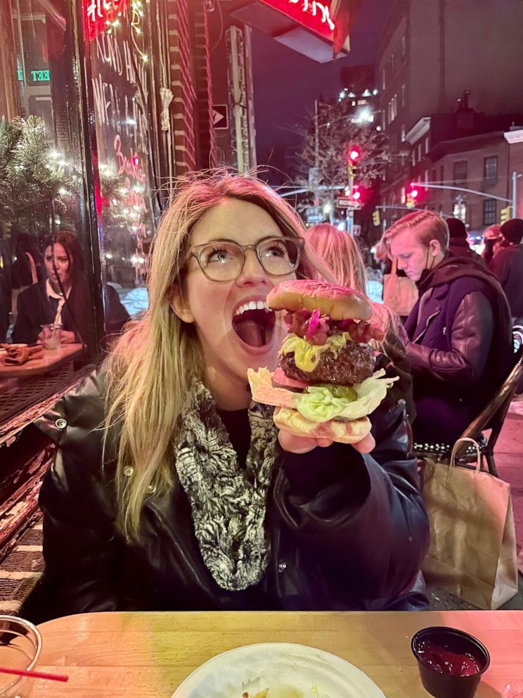 PHOTO: Kelly McCarthy enjoying a burger from Corner Bistro in New York City.