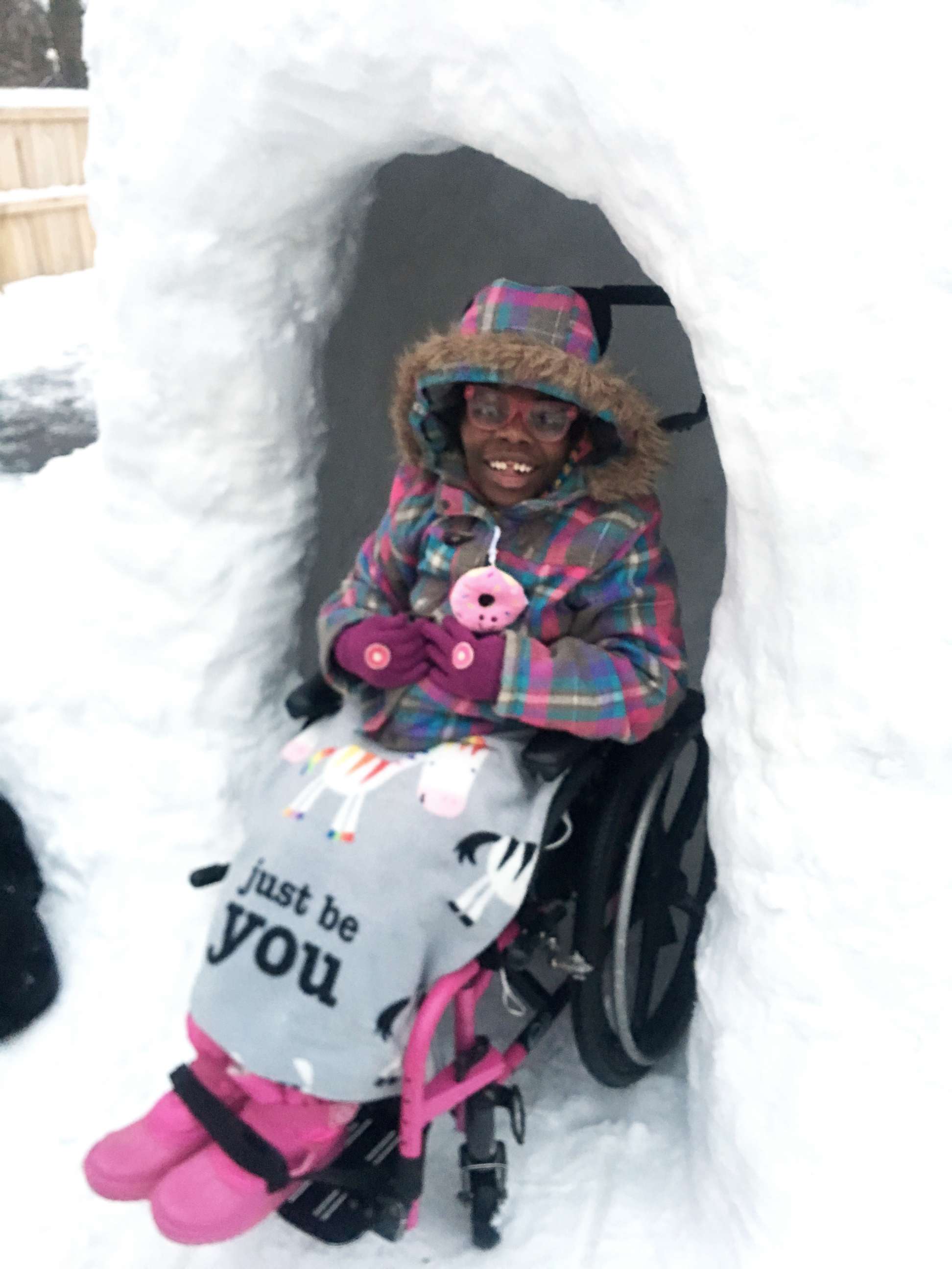 PHOTO: Zahara Eichhorn, of Ohio, poses in a snow fort built in her family's backyard.