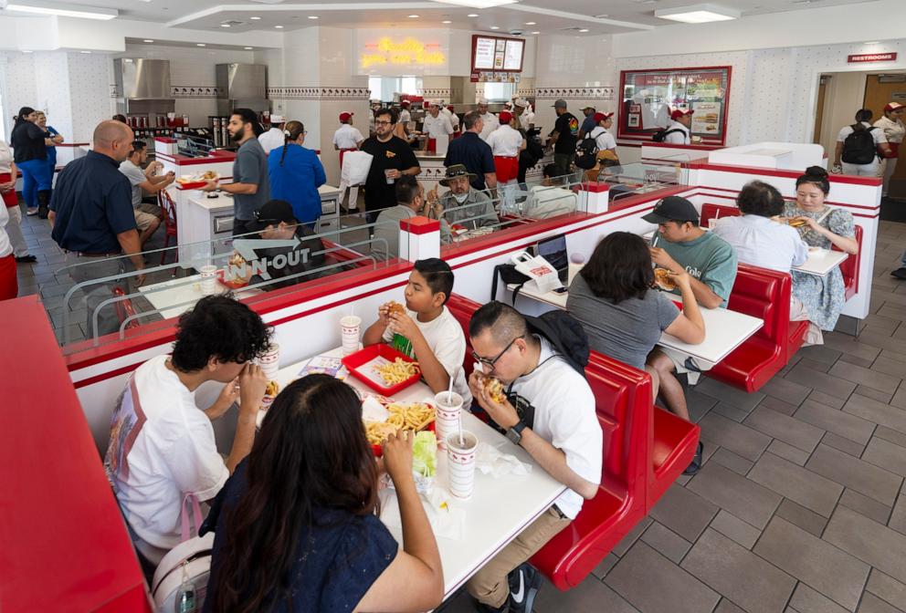 PHOTO: In this July 26, 2024, file photo, customers dine-in during opening day of the In-N-Out Burger at The Outlets at Orange in Orange, Calif.