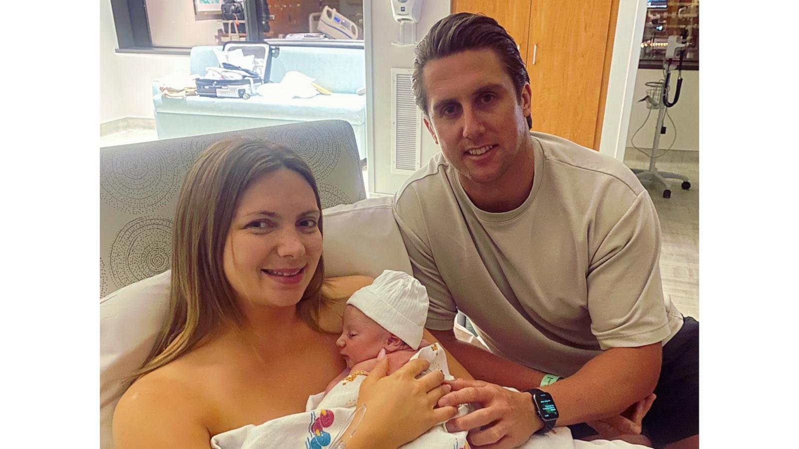 PHOTO: Maisie Savage and Josh French with their son Theo.