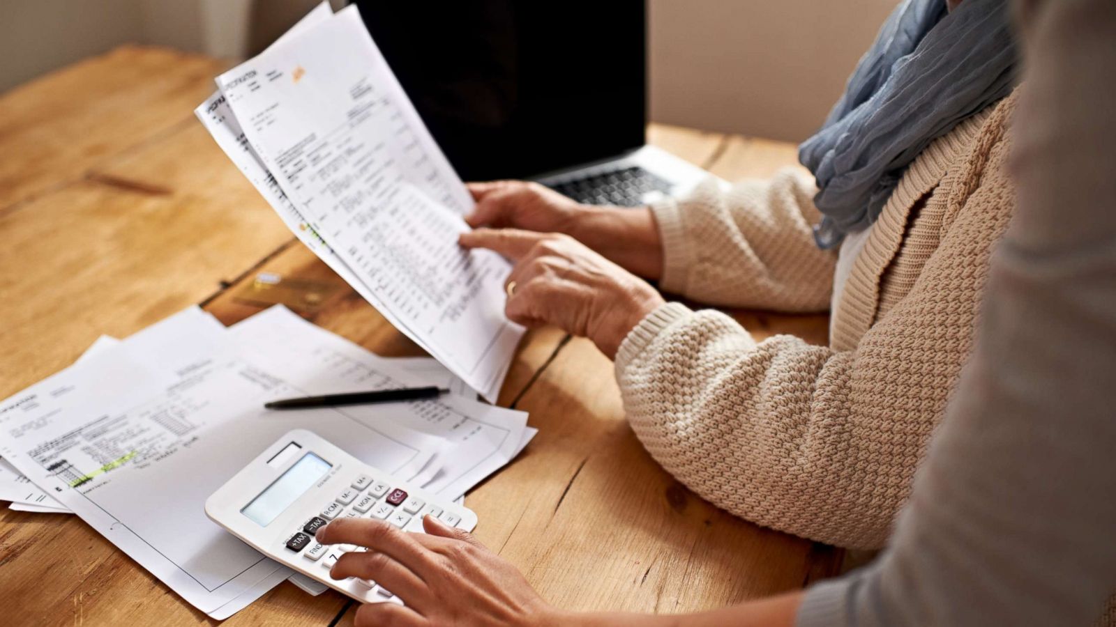 PHOTO: This stock photo depicts a woman going over her finances.