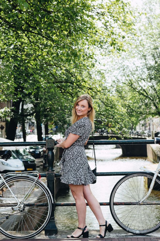 PHOTO: Lindenbergh's client poses for a photo at an Amsterdam canal.