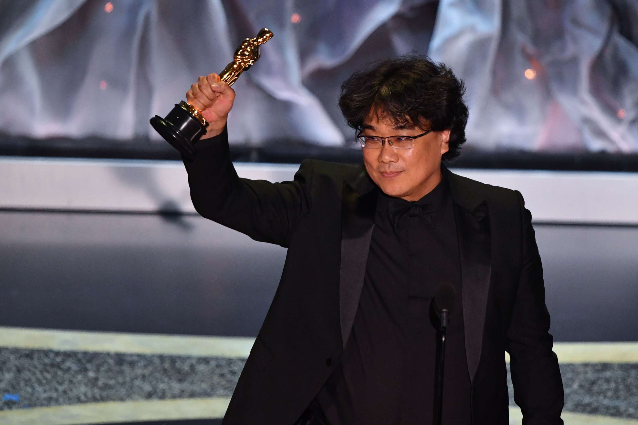 PHOTO: South Korean director Bong Joon-ho accepts the award for Best International Feature Film for "Parasite" during the 92nd Oscars at the Dolby Theatre in Hollywood, Calif., Feb. 9, 2020.