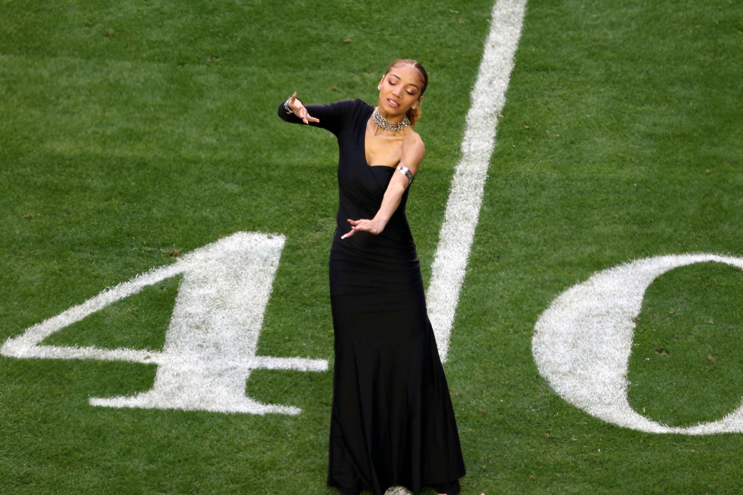 PHOTO: Justina Miles performs "Lift Every Voice and Sing" in American Sign Language prior to Super Bowl LVII between the Kansas City Chiefs and Philadelphia Eagles at State Farm Stadium, Feb. 12, 2023 in Glendale, Ariz.