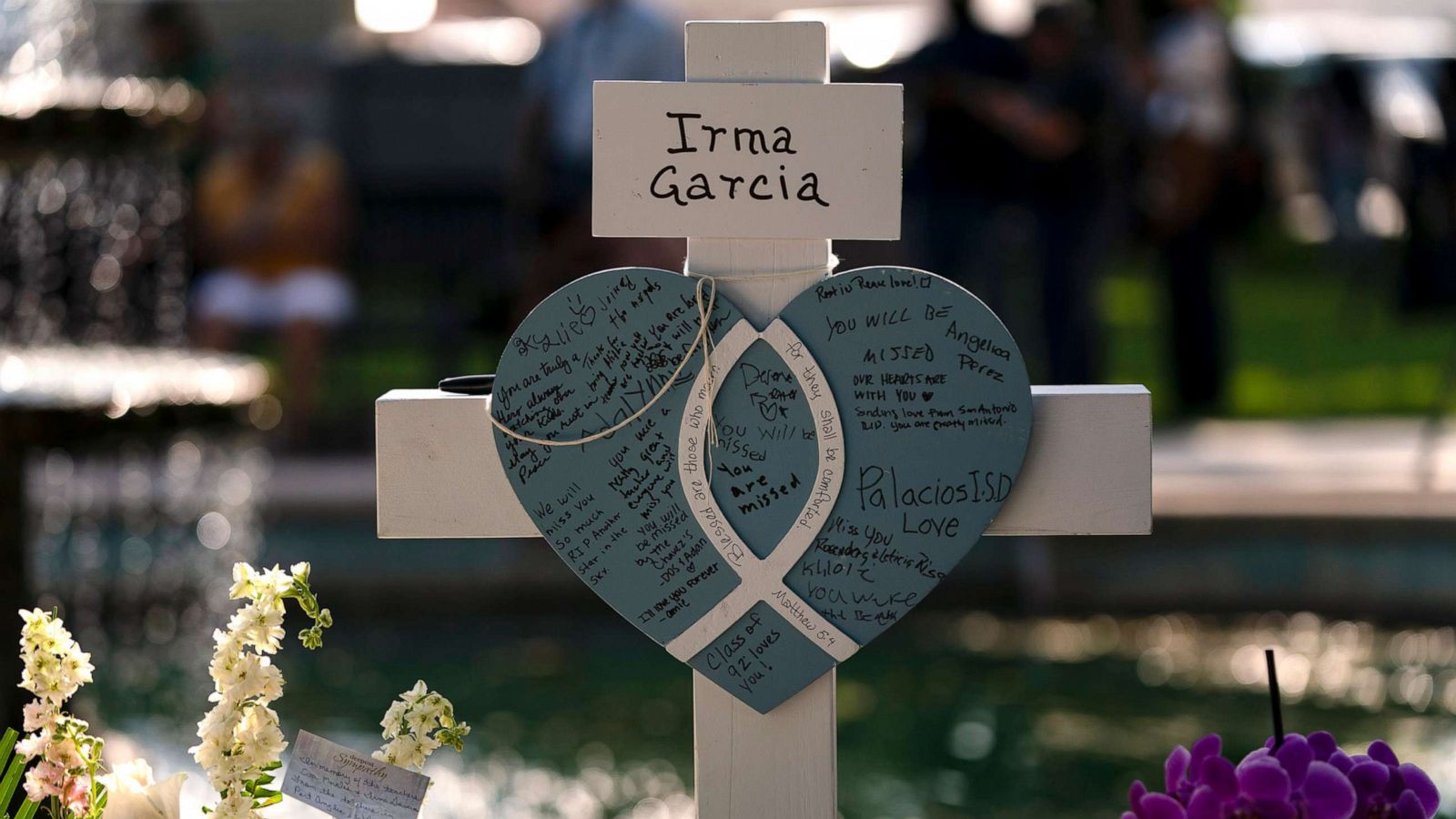 PHOTO: Messages are written on a cross honoring Irma Garcia, a teacher who was killed in this week's elementary school shooting, in Uvalde, Texas, May 26, 2022.